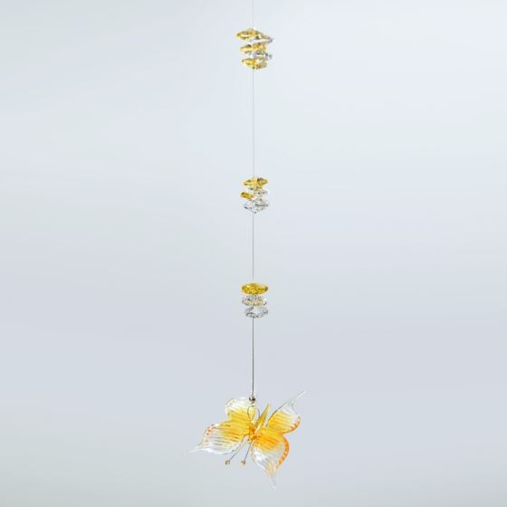 Decorative pendant with a yellow glass butterfly